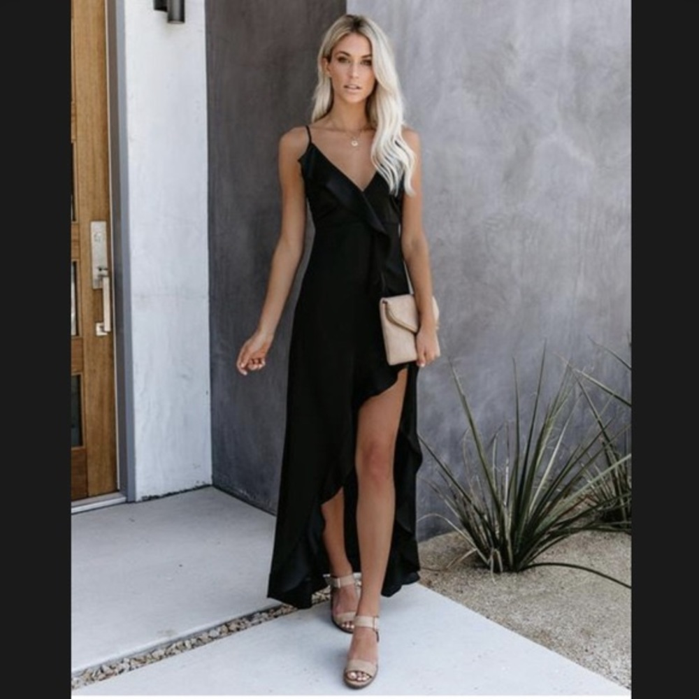 Black ruffle slit dress